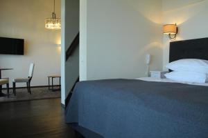 Postel nebo postele na pokoji v ubytování Margis Hotel & SPA
