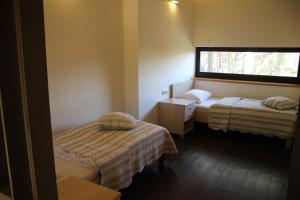Postel nebo postele na pokoji v ubytování Margis Hotel & SPA