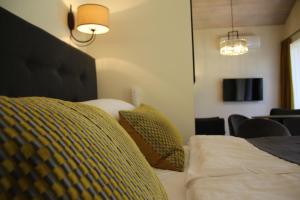 Postel nebo postele na pokoji v ubytování Margis Hotel & SPA