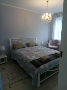 En eller flere senge i et værelse på Maza Venecija-Kuldiga