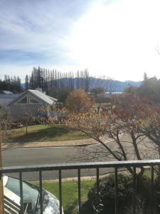 a view from the balcony of a house at Lansdown Peaks Apartments in Wanaka