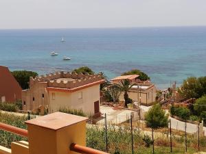 a view of the ocean from a house at Villa Fiorella in Sciacca