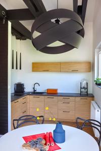 Kuchyň nebo kuchyňský kout v ubytování Apartament Berg + 31 fotografií
