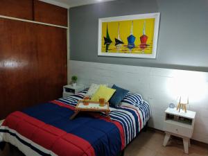 Кровать или кровати в номере Terrazas de providencia