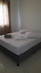 Postel nebo postele na pokoji v ubytování Solar das Sabiás Harmonia com a Natureza