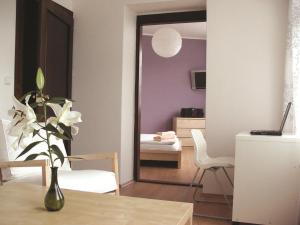 Predel za sedenje v nastanitvi Hotel Saloon