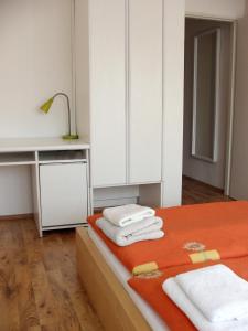 Postelja oz. postelje v sobi nastanitve Hotel Saloon