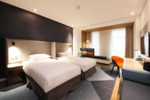 Postel nebo postele na pokoji v ubytování Holiday Inn Express Hefei Shushan by IHG