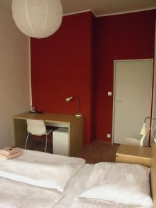Postelja oz. postelje v sobi nastanitve Hotel Saloon