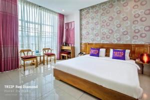 Letto o letti in una camera di Red Diamond Hotel