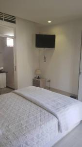Ein Bett oder Betten in einem Zimmer der Unterkunft Riverside Villa Homestay