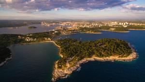 an aerial view of a small island in the water at APARTMAN IVANA in Pula