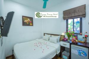 Voodi või voodid majutusasutuse Tung Trang Hotel toas
