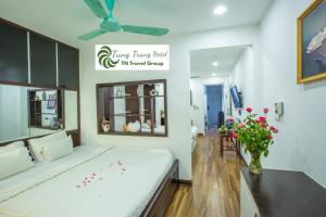 Voodi või voodid majutusasutuse Tung Trang Hotel toas