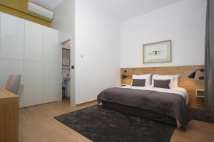 Ein Bett oder Betten in einem Zimmer der Unterkunft Rooms Alla Beccaccia