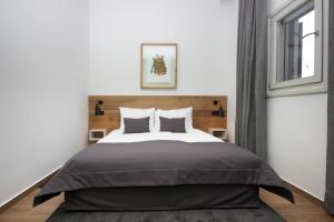 Ein Bett oder Betten in einem Zimmer der Unterkunft Rooms Alla Beccaccia