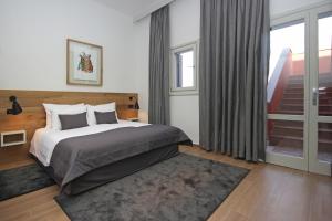 Ein Bett oder Betten in einem Zimmer der Unterkunft Rooms Alla Beccaccia