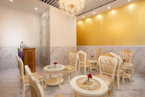 Predel za sedenje v nastanitvi Ramada Hong Kong Grand View
