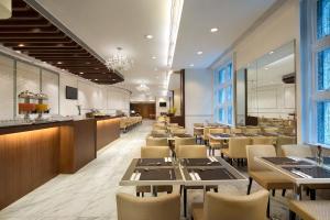 Predel za sedenje v nastanitvi Ramada Hong Kong Grand View