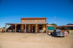 an old car parked in front of a building at The Silverton Hotel in Silverton