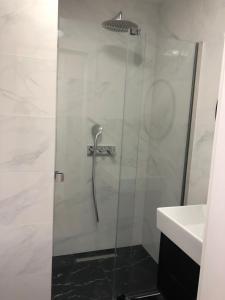 Kúpeľňa v ubytovaní Apartament Komfortowy z klimatyzacja Plazowa 6