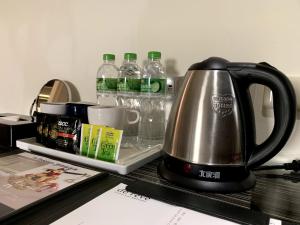 Tetera y cafetera en de rěve Express Hotel