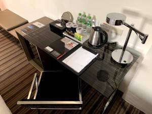 Tetera y cafetera en de rěve Express Hotel