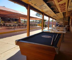 a pool table in the middle of a patio at The Silverton Hotel in Silverton