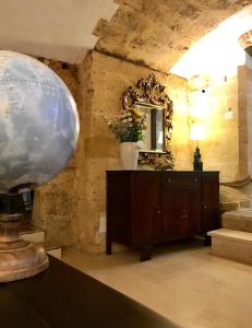 a room with a mirror and a dresser at Ponticelli B&B Boutique in Gravina in Puglia +42 photos