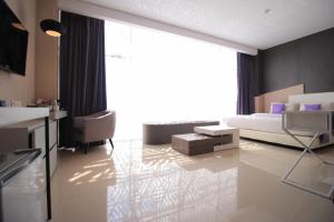 Posezení v ubytování Forriz Hotel Yogyakarta