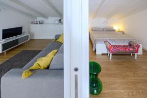 Una cama o camas en una habitación de Casetta Gattini