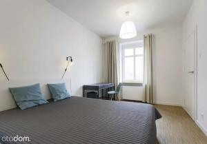 Posteľ alebo postele v izbe v ubytovaní Stylowy 2-pokojowy apartament 5 min. od Rynku