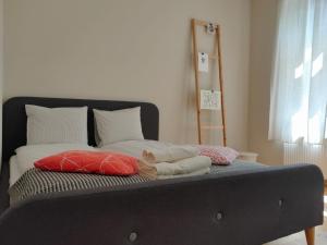 Łóżko lub łóżka w pokoju w obiekcie apartament Sandomierska
