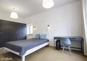Posteľ alebo postele v izbe v ubytovaní Stylowy 2-pokojowy apartament 5 min. od Rynku
