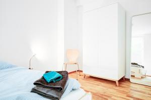 Ein Bett oder Betten in einem Zimmer der Unterkunft Ferienwohnung Fjordblick in Flensburg, Sonwik