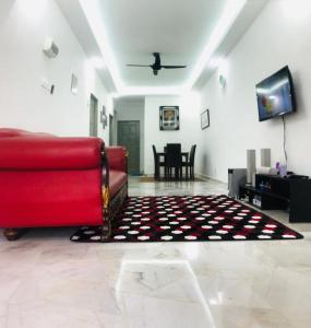 TV a/nebo společenská místnost v ubytování Pinggiran Homestay + 2 fotografie