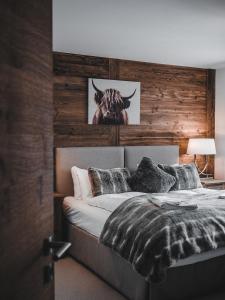Postel nebo postele na pokoji v ubytování Sonnegg Lodge 2.1