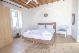 Postel nebo postele na pokoji v ubytování Villa Phoebe
