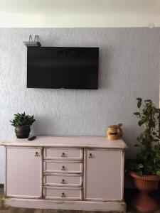 TV a/nebo společenská místnost v ubytování P Stradiņa Street 17