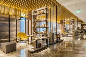 Predel za sedenje v nastanitvi Yunhe Yebo Hotel (Shanghai International Tourism Resort Pudong Airport)