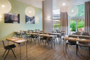 Un restaurant sau alt loc unde se poate mânca la Best Western Plus Hotel Du Parc Chantilly