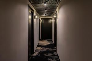 a corridor of a corridor with a hallway at Chapter Roma in Rome