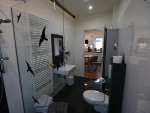 Ein Badezimmer in der Unterkunft Küstenwilla FeWo Usedom