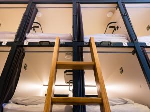 Cama ou camas em um quarto em Latroupe Jacobs Inn