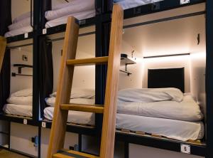 Cama ou camas em um quarto em Latroupe Jacobs Inn