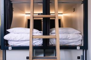 Cama ou camas em um quarto em Latroupe Jacobs Inn