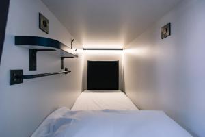 Cama ou camas em um quarto em Latroupe Jacobs Inn