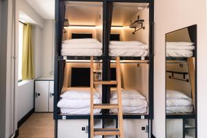Cama ou camas em um quarto em Latroupe Jacobs Inn
