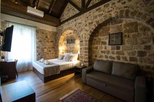 Postel nebo postele na pokoji v ubytování D'Argento Boutique Rooms