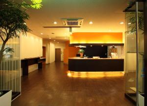 Лобби или стойка регистрации в Hotel 1-2-3 Kofu Shingen Onsen